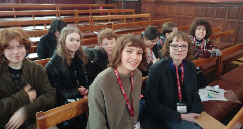 Pictured from left to right in the main debating chamber at the Oxford Union: Hannah H, Rachel R, Theo GJ, Masha S, David C, Laurie B, Siri K, Tj Williams